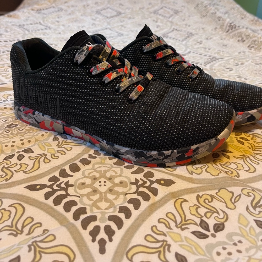 Black No-Bull with Red/Gray/Black soles.
